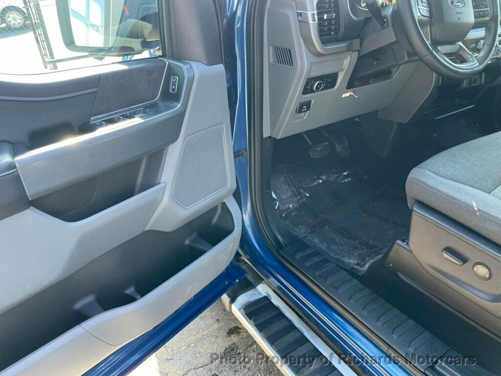 2024 Ford F-150 XLT 4WD SuperCrew 5.5' Box - Antimatter Blue Metallic exterior view 10