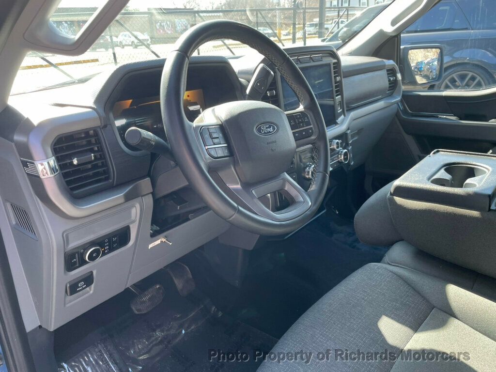 2024 Ford F-150 XLT 4WD SuperCrew 5.5' Box - Antimatter Blue Metallic exterior view 11