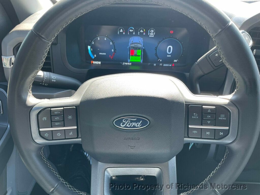 2024 Ford F-150 XLT 4WD SuperCrew 5.5' Box - Antimatter Blue Metallic exterior view 14