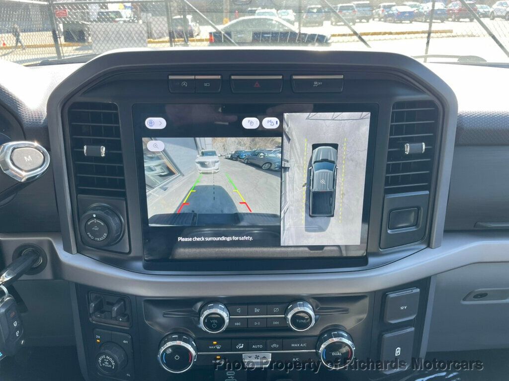 2024 Ford F-150 XLT 4WD SuperCrew 5.5' Box - Antimatter Blue Metallic exterior view 16