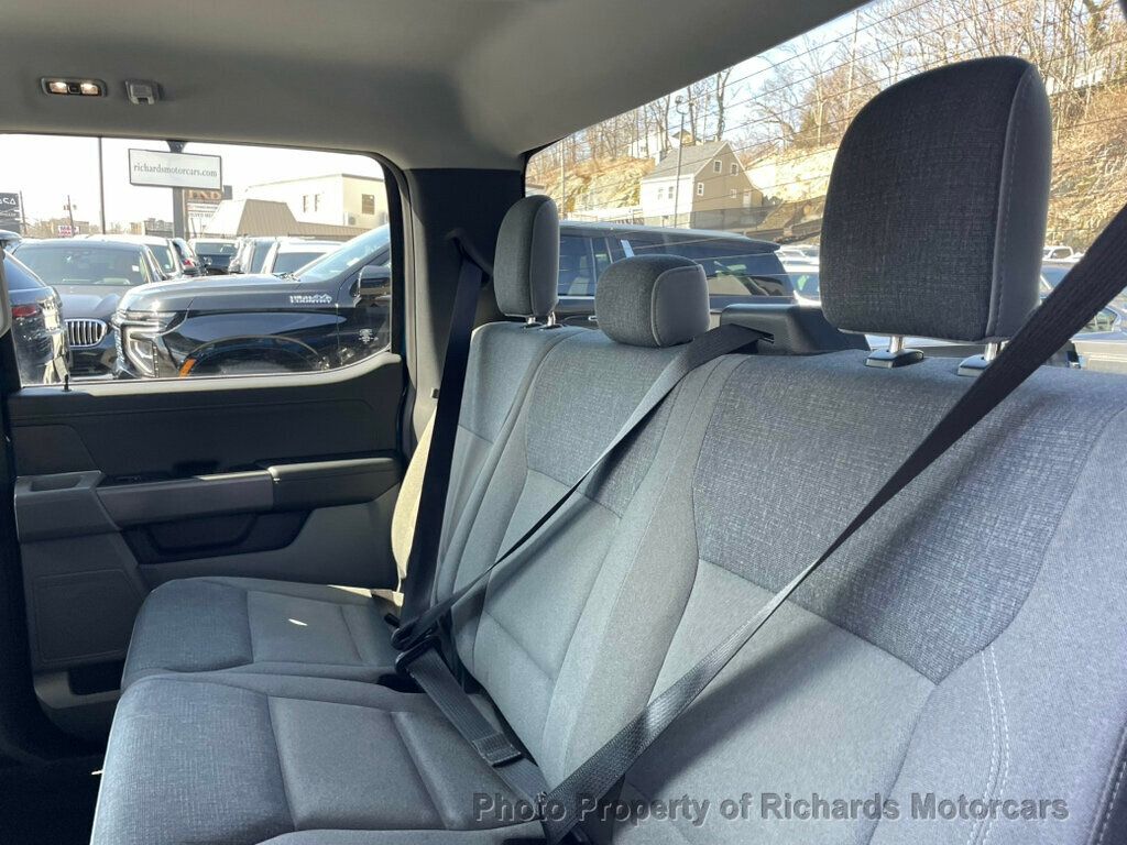 2024 Ford F-150 XLT 4WD SuperCrew 5.5' Box - Antimatter Blue Metallic exterior view 19