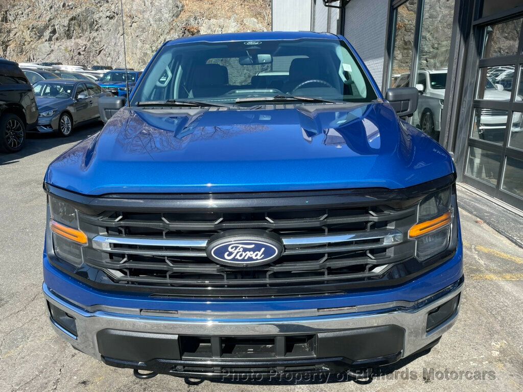 2024 Ford F-150 XLT 4WD SuperCrew 5.5' Box - Antimatter Blue Metallic exterior view 4
