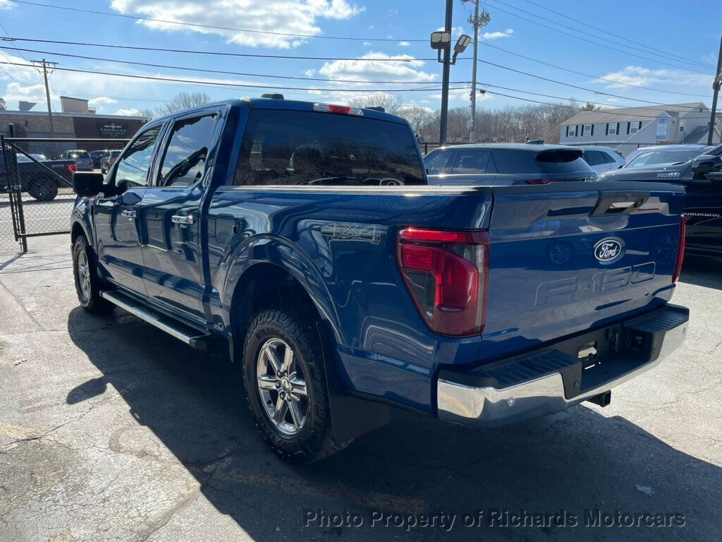 2024 Ford F-150 XLT 4WD SuperCrew 5.5' Box - Antimatter Blue Metallic exterior view 6