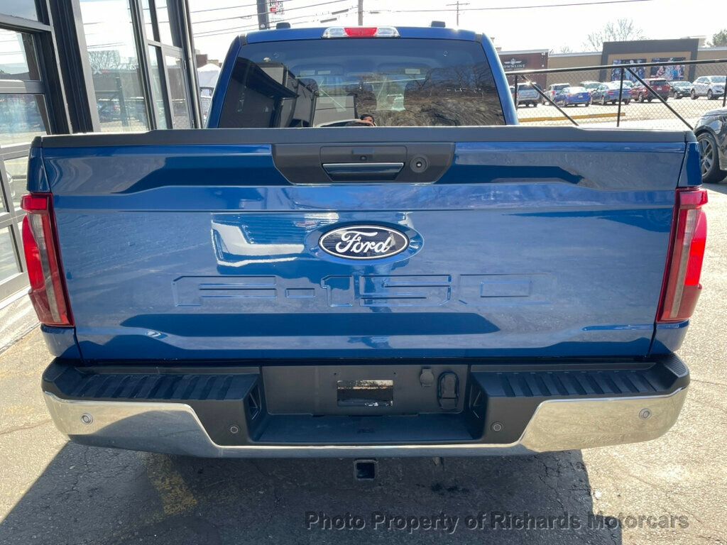 2024 Ford F-150 XLT 4WD SuperCrew 5.5' Box - Antimatter Blue Metallic exterior view 7