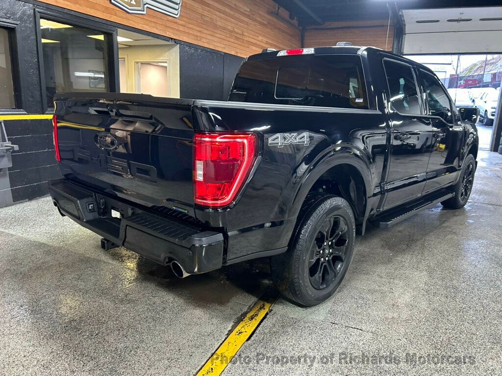 2023 Ford F-150 XLT 4WD SuperCrew 5.5' Box - Agate Black Metallic exterior view 3