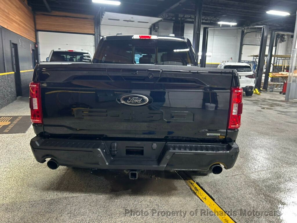 2023 Ford F-150 XLT 4WD SuperCrew 5.5' Box - Agate Black Metallic exterior view 4