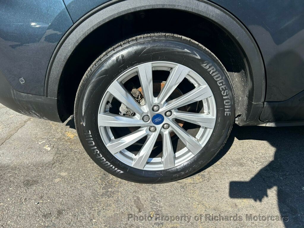 2022 Ford Escape Titanium Hybrid AWD - Carbonized Gray Metallic exterior view 8