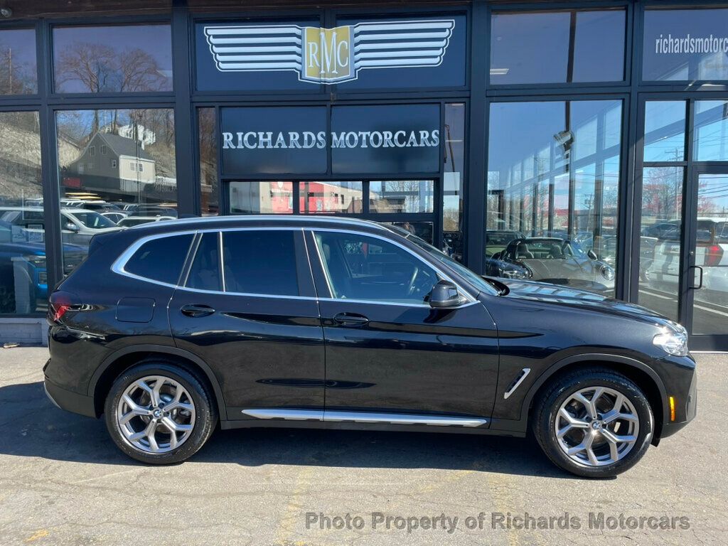 2023 BMW X3 xDrive30i Sports Activity Vehicle - Black Sapphire Metallic exterior view 2