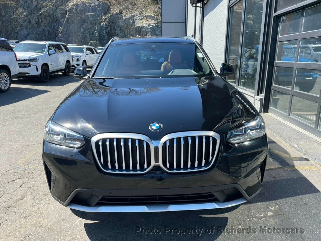2023 BMW X3 xDrive30i Sports Activity Vehicle - Black Sapphire Metallic exterior view 4