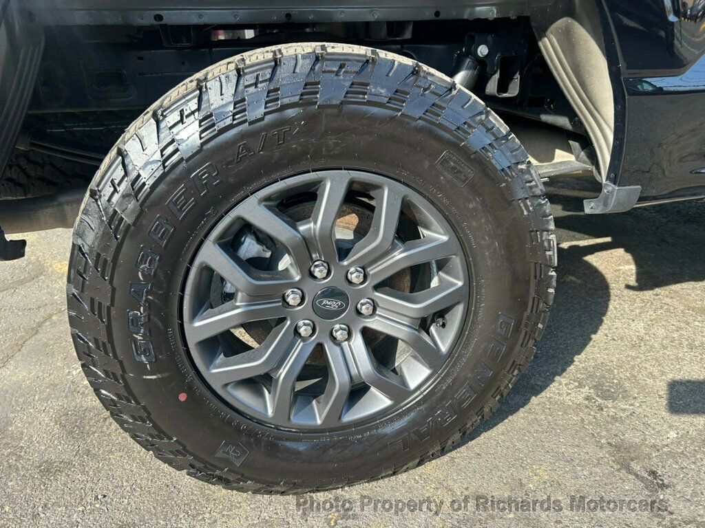 2025 Ford F-150 Tremor 4WD SuperCrew 5.5' Box - Agate Black Metallic exterior view 10