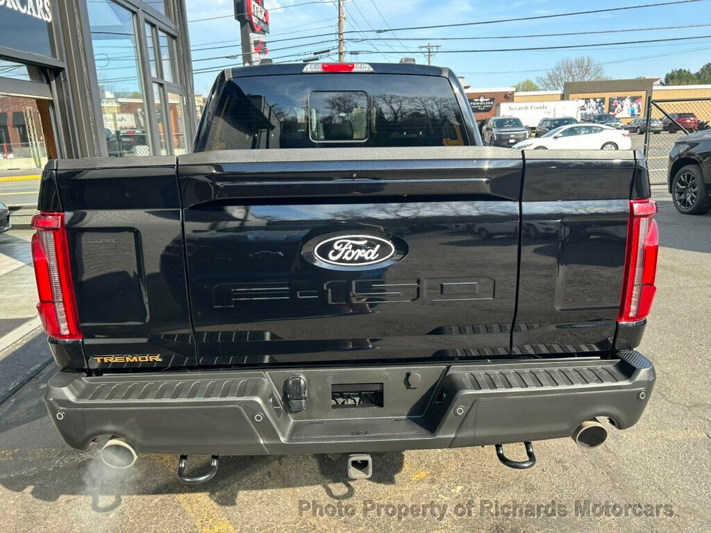 2025 Ford F-150 Tremor 4WD SuperCrew 5.5' Box - Agate Black Metallic exterior view 4