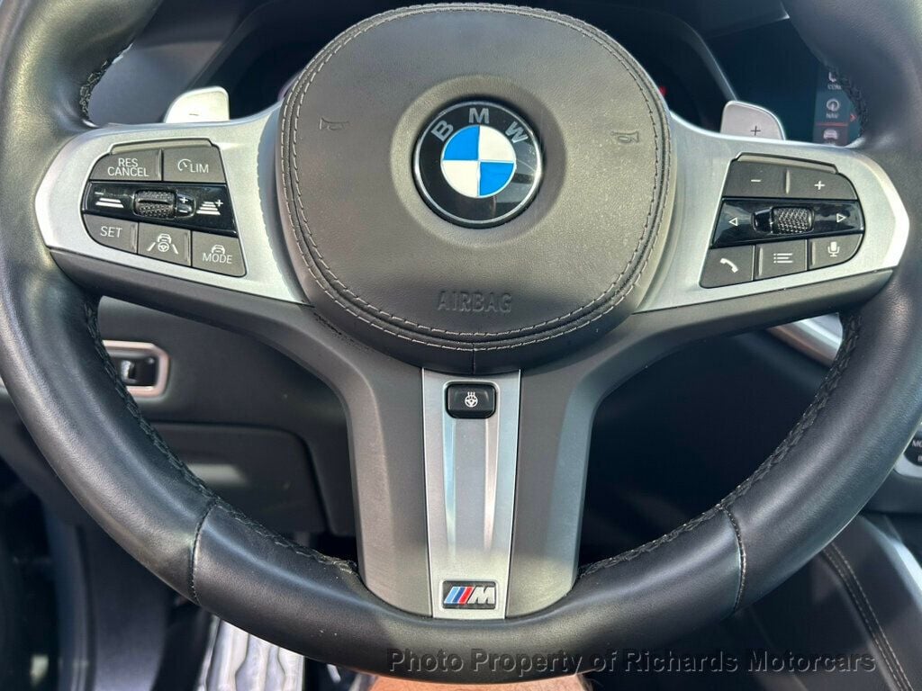 2022 BMW X6 xDrive40i Sports Activity - Dravit Grey Metallic exterior view 14