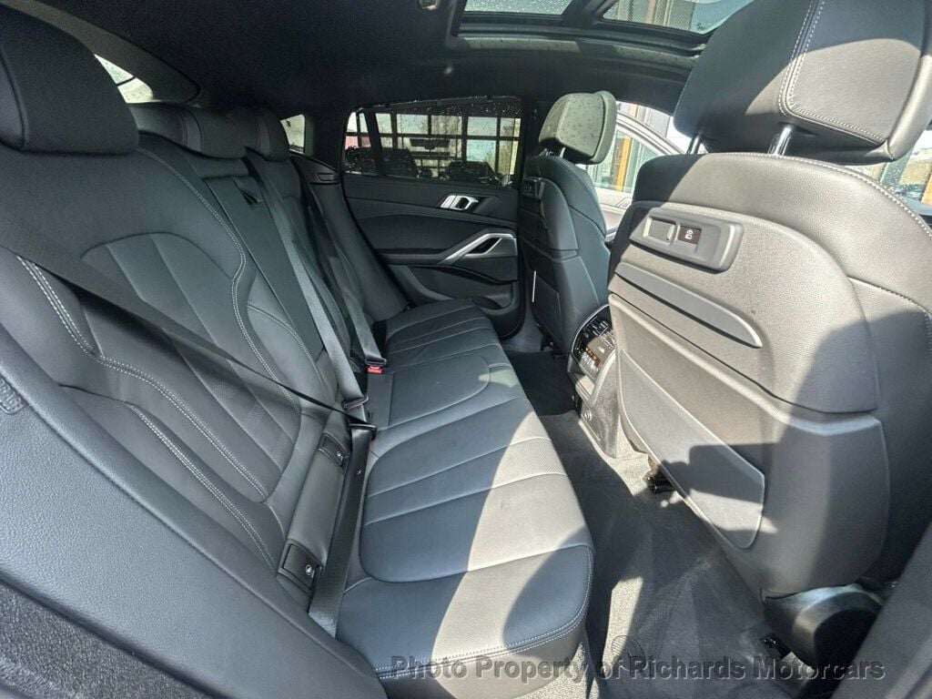 2022 BMW X6 xDrive40i Sports Activity - Dravit Grey Metallic exterior view 19