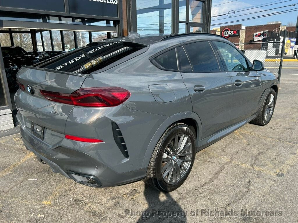 2022 BMW X6 xDrive40i Sports Activity - Dravit Grey Metallic exterior view 3