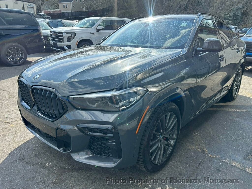 2022 BMW X6 xDrive40i Sports Activity - Dravit Grey Metallic exterior view 6