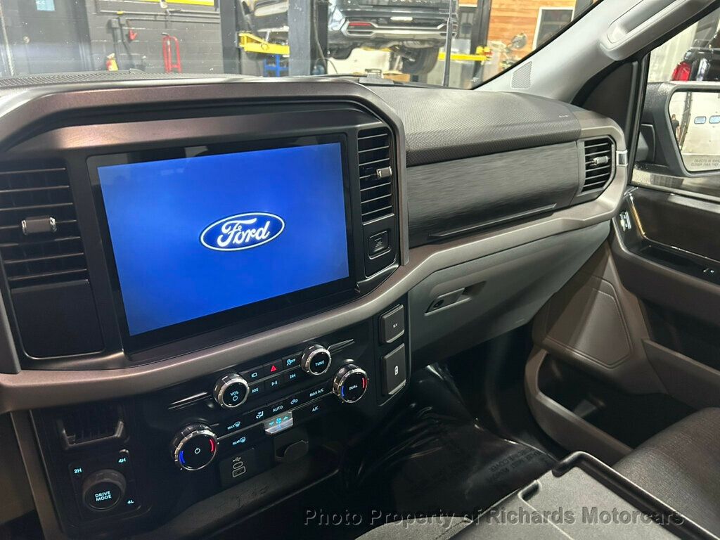 2025 Ford F-150 XLT 4WD SuperCrew 5.5' Box - Agate Black Metallic exterior view 13