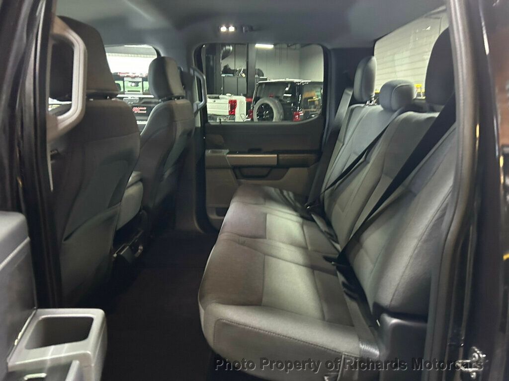 2025 Ford F-150 XLT 4WD SuperCrew 5.5' Box - Agate Black Metallic exterior view 15