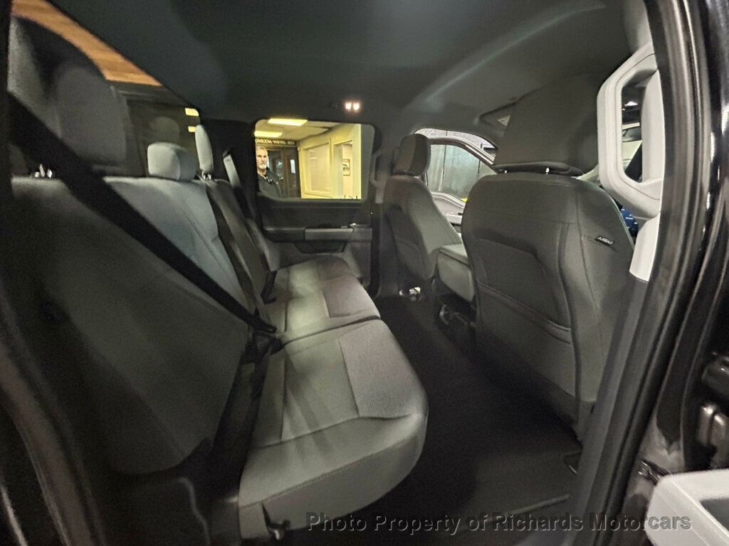 2025 Ford F-150 XLT 4WD SuperCrew 5.5' Box - Agate Black Metallic exterior view 17