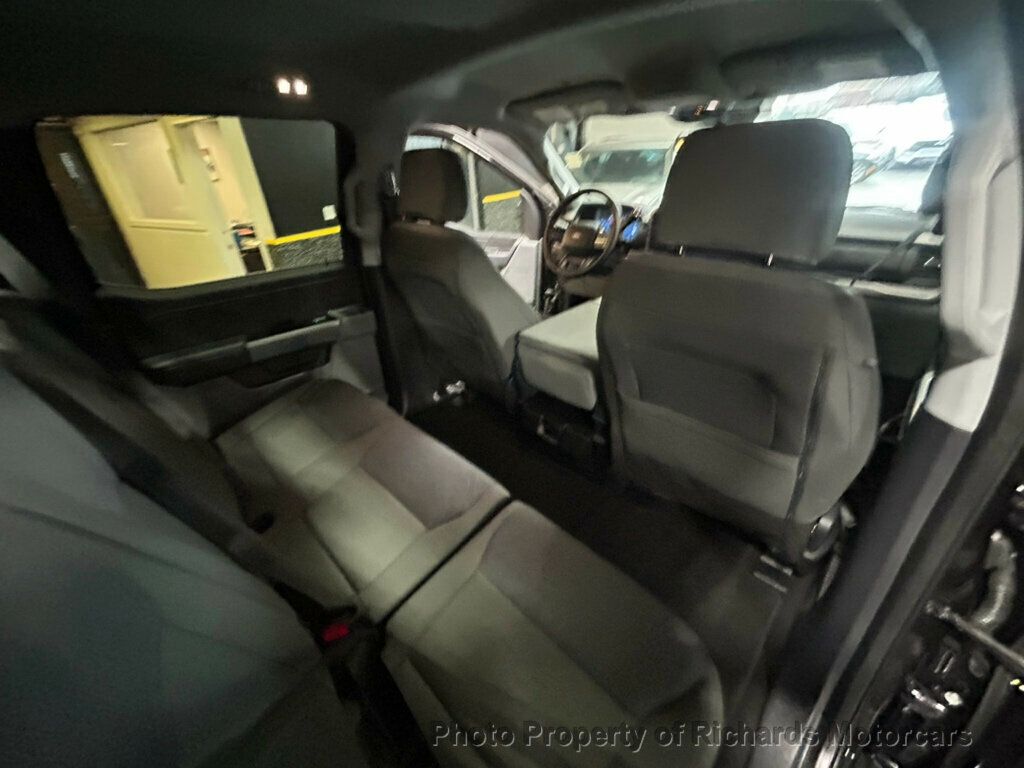 2025 Ford F-150 XLT 4WD SuperCrew 5.5' Box - Agate Black Metallic exterior view 18