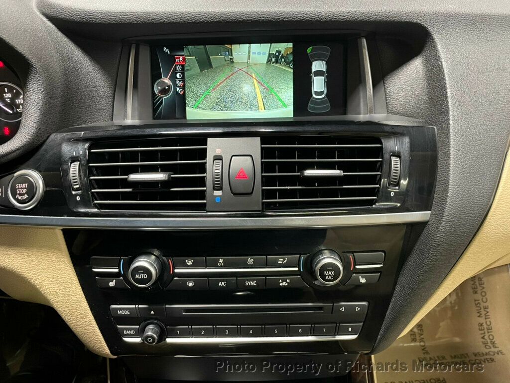 2016 BMW X4 xDrive28i - Mineral White Metallic exterior view 14