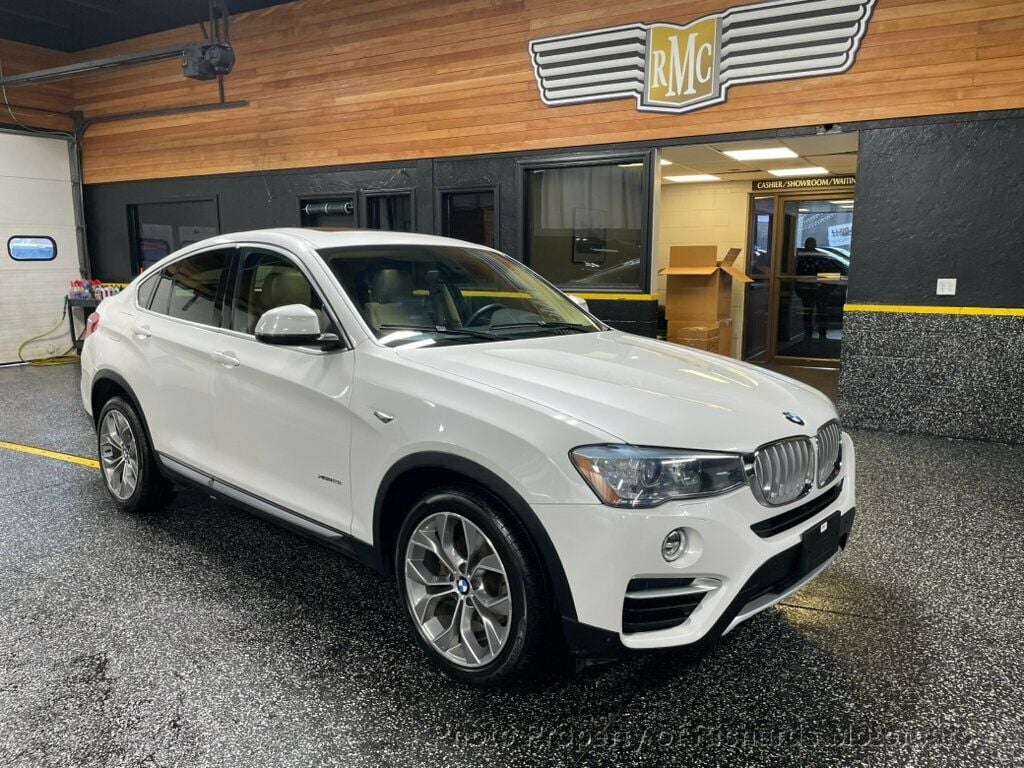 2016 BMW X4 xDrive28i - Mineral White Metallic exterior view 2