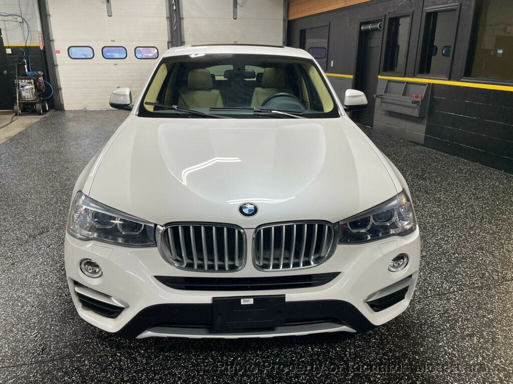 2016 BMW X4 xDrive28i - Mineral White Metallic exterior view 3