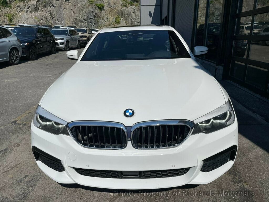 2019 BMW 5 Series 540i xDrive - Alpine White exterior view 4