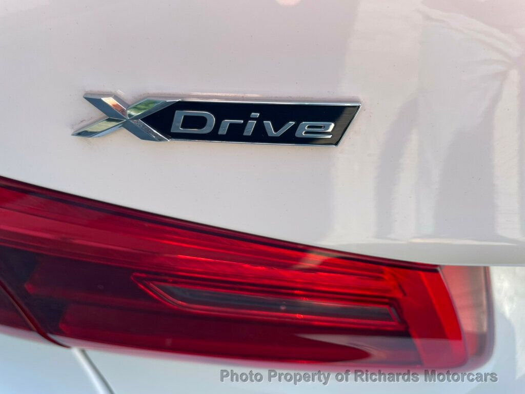 2019 BMW 5 Series 540i xDrive - Alpine White exterior view 9