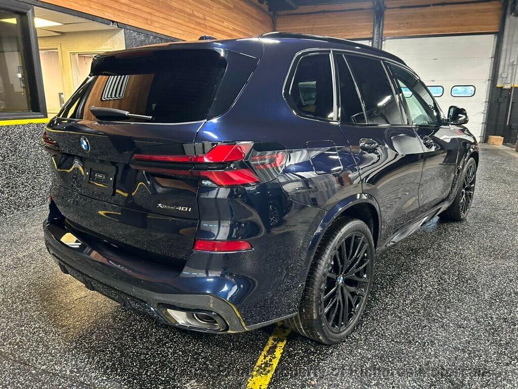 2026 BMW X5 xDrive40i Sports Activity Vehicle - Marina Bay Blue Metallic exterior view 3