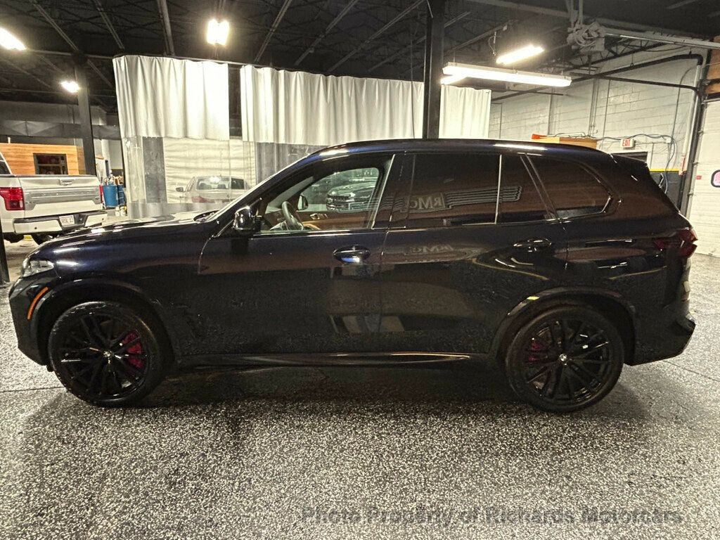 2026 BMW X5 xDrive40i Sports Activity Vehicle - Marina Bay Blue Metallic exterior view 6