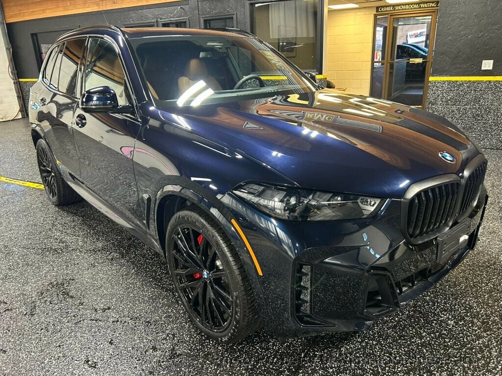 2026 BMW X5 xDrive40i Sports Activity Vehicle - Marina Bay Blue Metallic exterior view 9