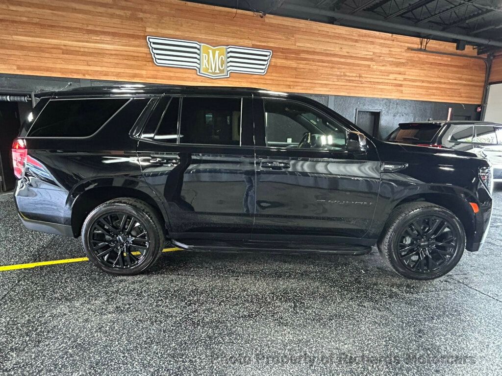 2023 GMC Yukon 4WD 4dr SLE - Onyx Black exterior view 2