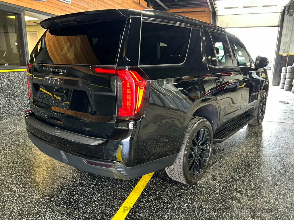 2023 GMC Yukon 4WD 4dr SLE - Onyx Black exterior view 3