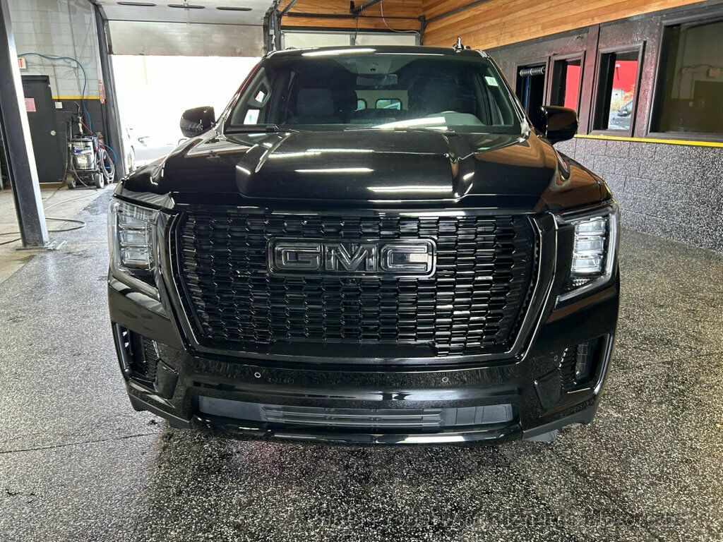 2023 GMC Yukon 4WD 4dr SLE - Onyx Black exterior view 8