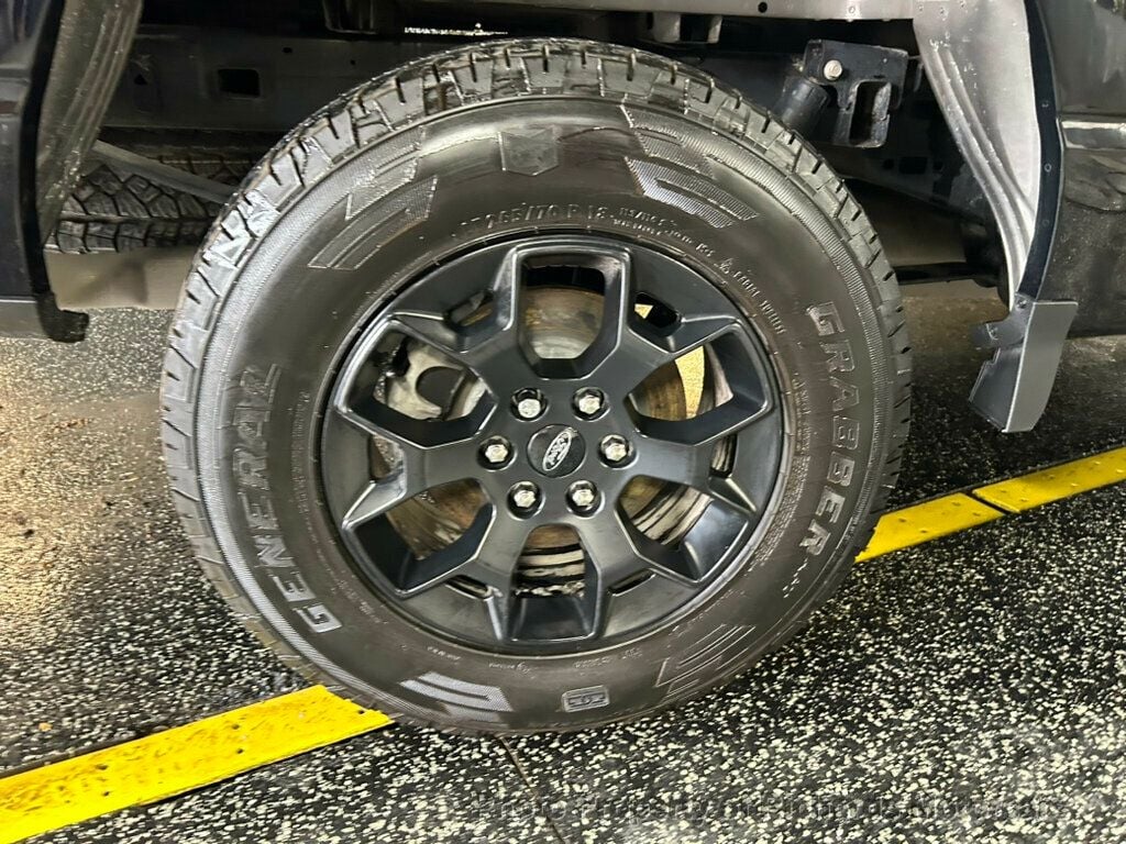 2024 Ford F-150 STX 4WD SuperCrew 5.5' Box - Agate Black Metallic exterior view 10