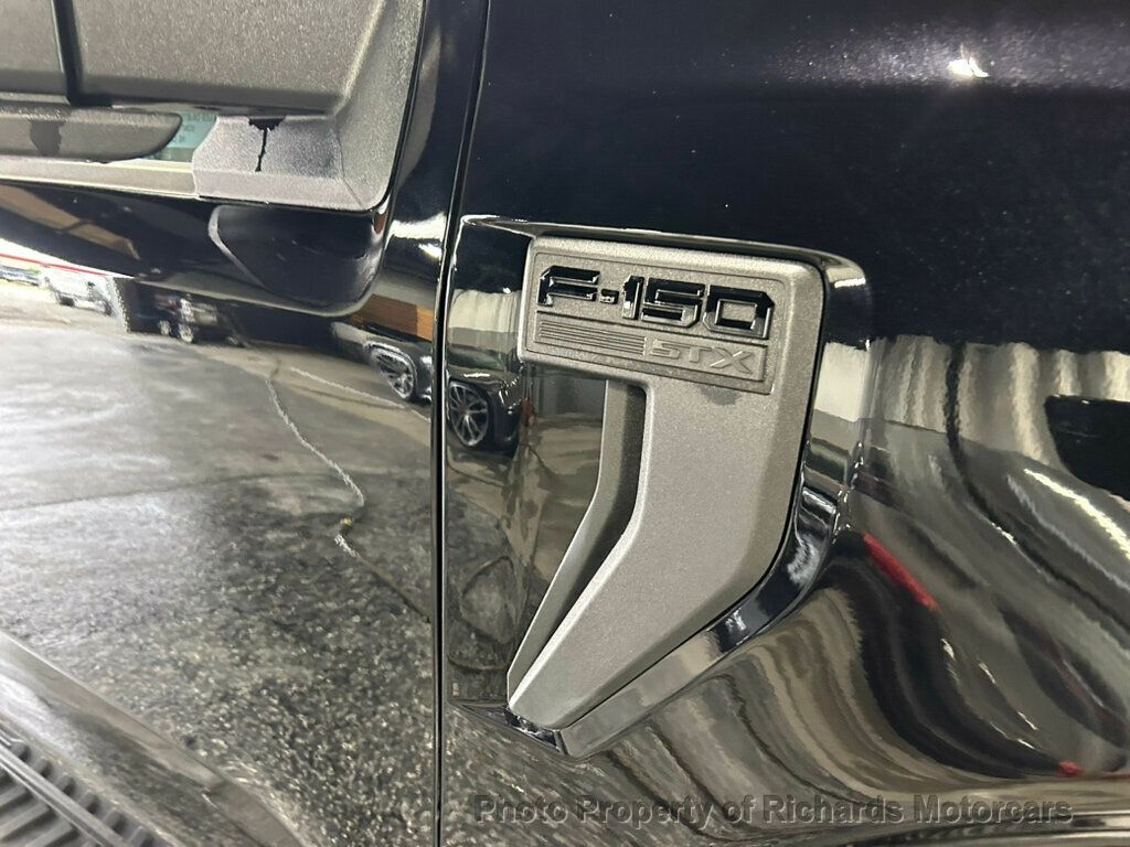 2024 Ford F-150 STX 4WD SuperCrew 5.5' Box - Agate Black Metallic exterior view 9