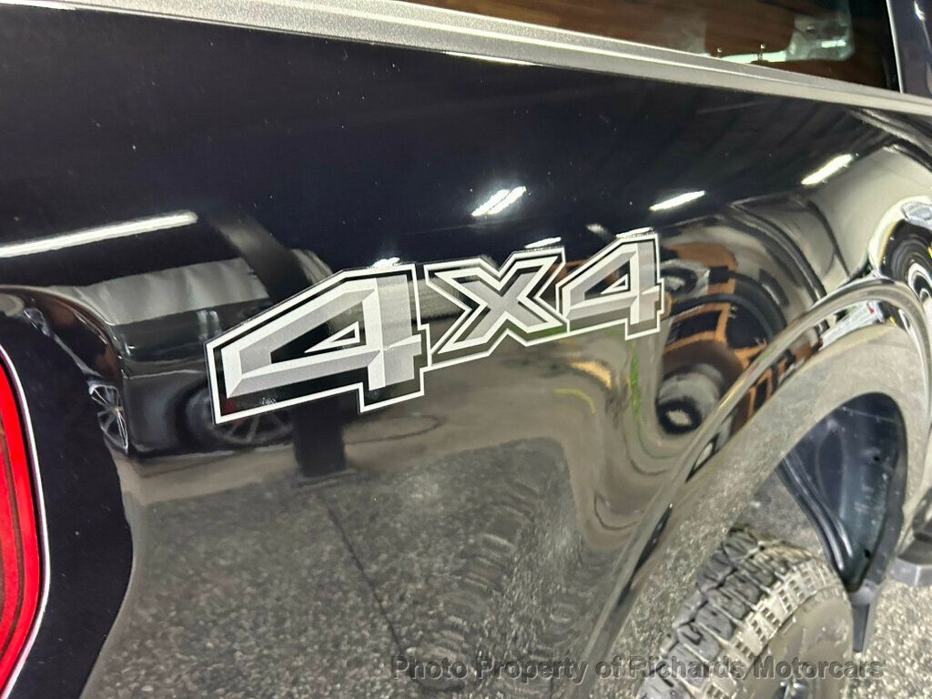 2024 Ford F-150 XLT 4WD SuperCrew 5.5' Box - Agate Black Metallic exterior view 12
