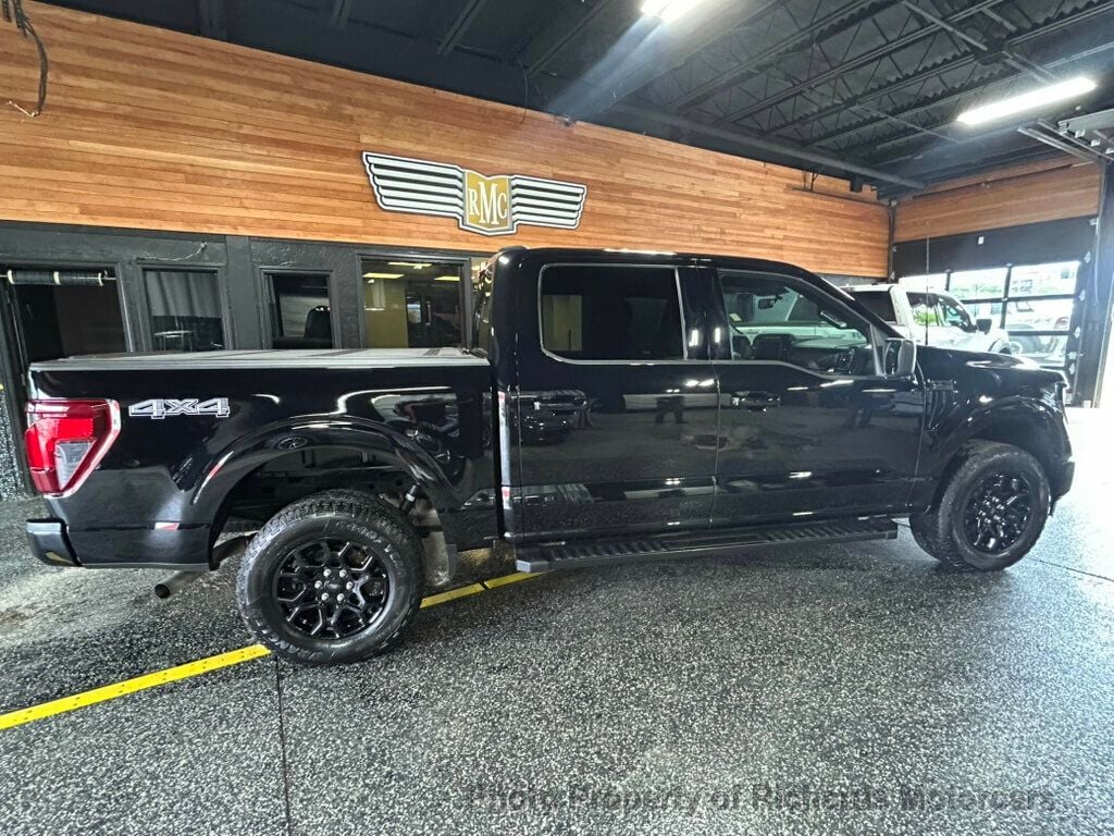 2024 Ford F-150 XLT 4WD SuperCrew 5.5' Box - Agate Black Metallic exterior view 2