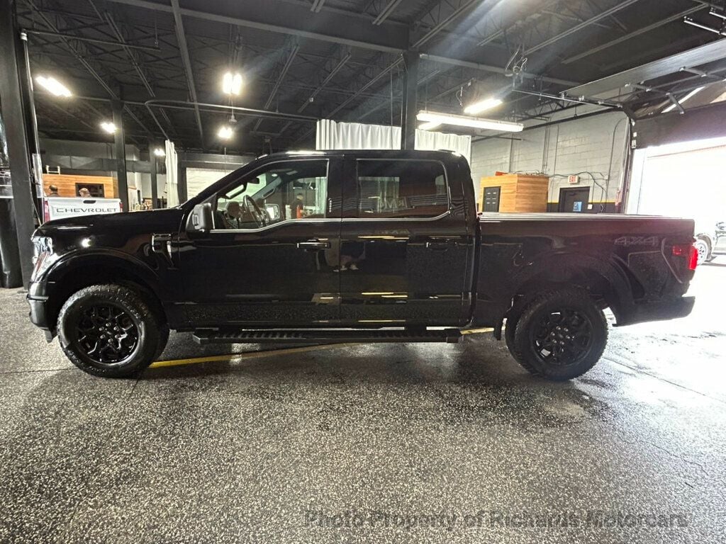 2024 Ford F-150 XLT 4WD SuperCrew 5.5' Box - Agate Black Metallic exterior view 6