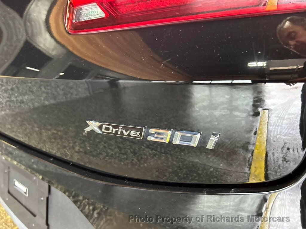 2023 BMW X4 xDrive30i Sports Activity - Jet Black exterior view 10