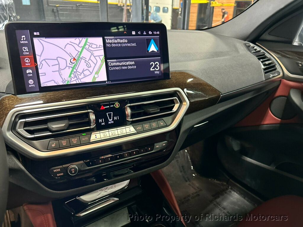 2023 BMW X4 xDrive30i Sports Activity - Jet Black exterior view 13