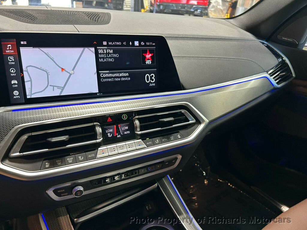 2021 BMW X5 xDrive40i Sports Activity Vehicle - Mineral White Metallic exterior view 11