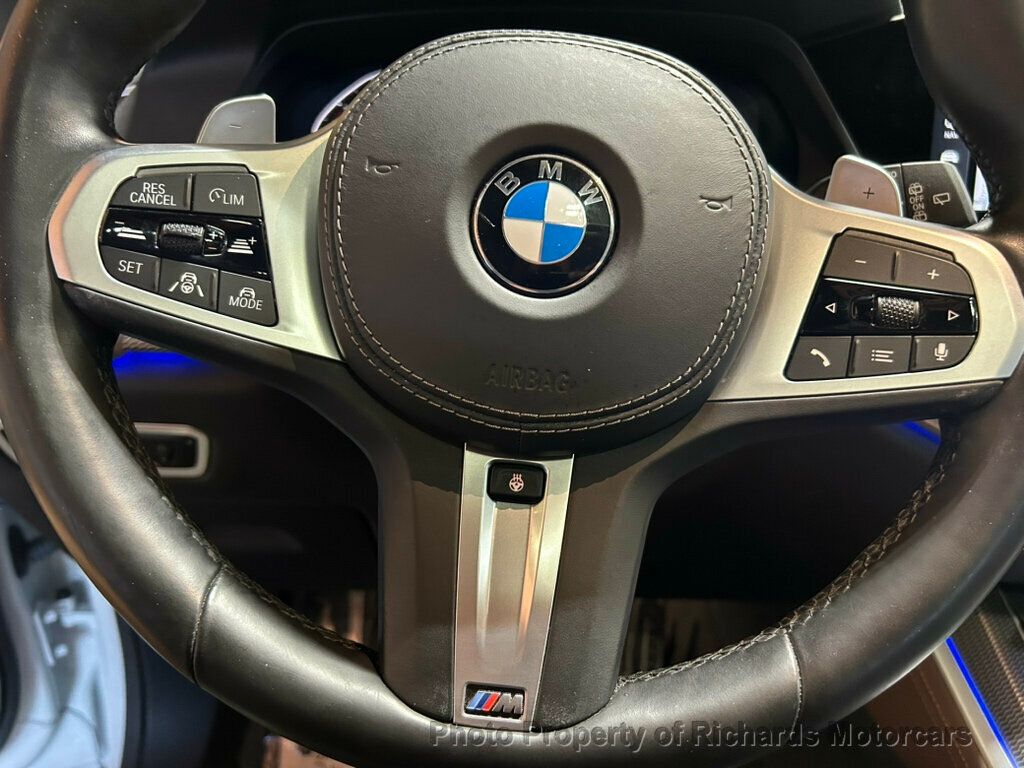 2021 BMW X5 xDrive40i Sports Activity Vehicle - Mineral White Metallic exterior view 12