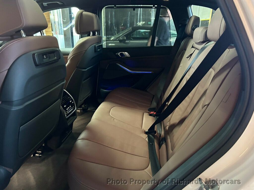 2021 BMW X5 xDrive40i Sports Activity Vehicle - Mineral White Metallic exterior view 17