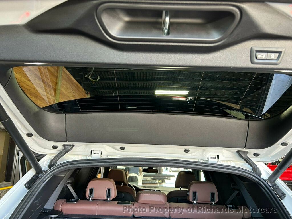 2021 BMW X5 xDrive40i Sports Activity Vehicle - Mineral White Metallic exterior view 20