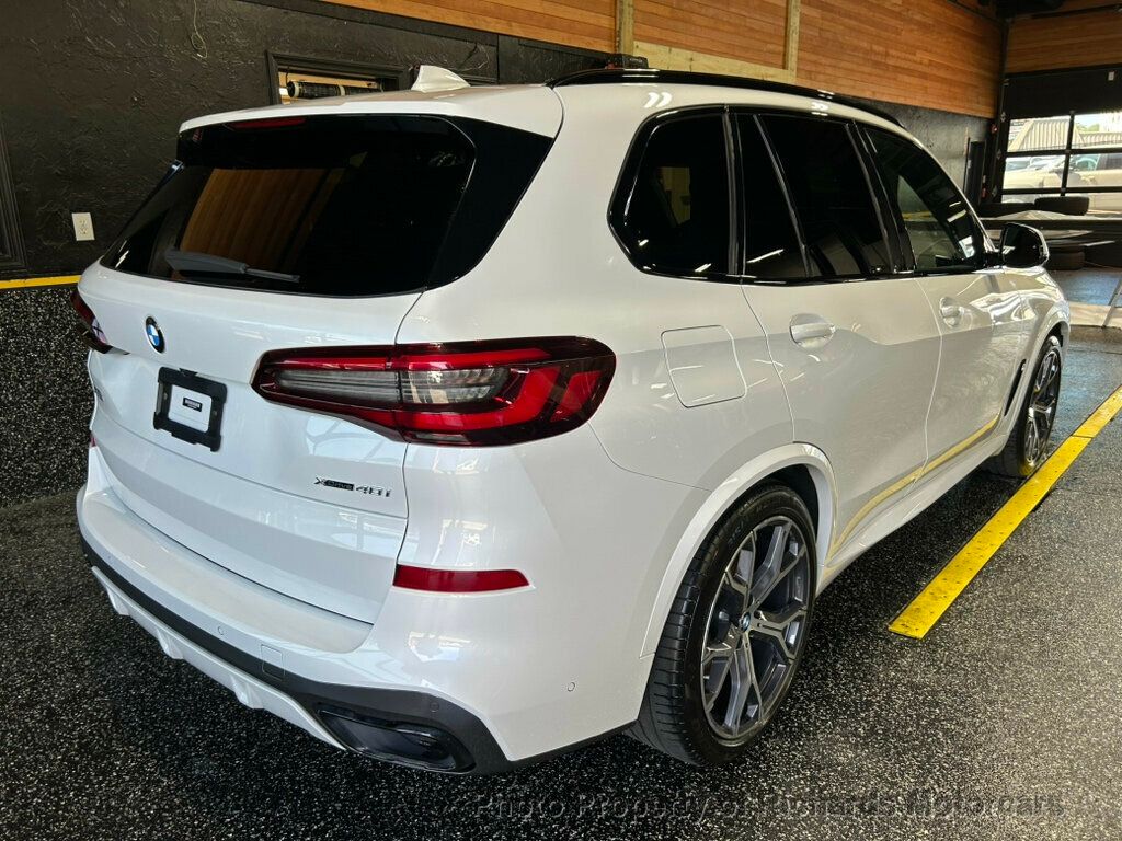 2021 BMW X5 xDrive40i Sports Activity Vehicle - Mineral White Metallic exterior view 3