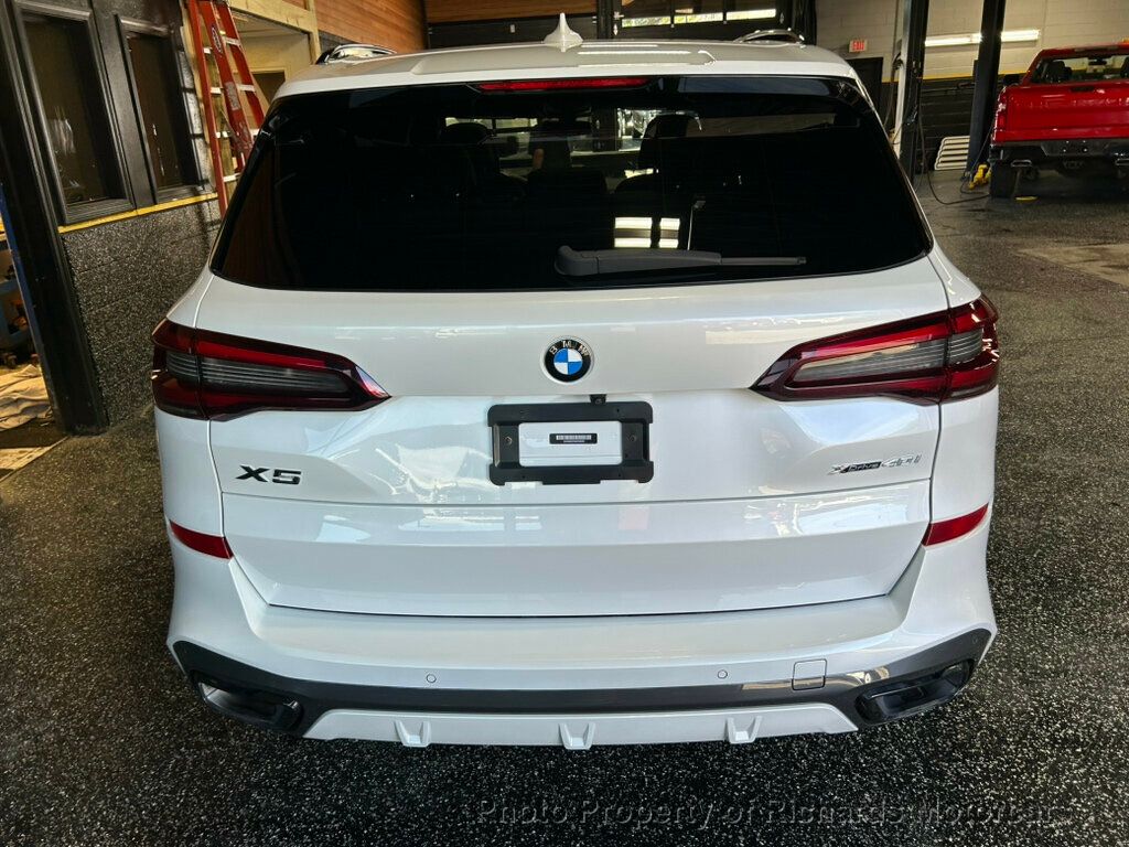 2021 BMW X5 xDrive40i Sports Activity Vehicle - Mineral White Metallic exterior view 4