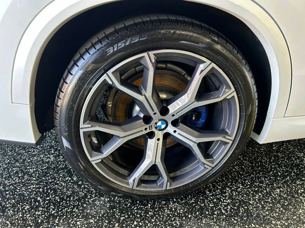 2021 BMW X5 xDrive40i Sports Activity Vehicle - Mineral White Metallic exterior view 7