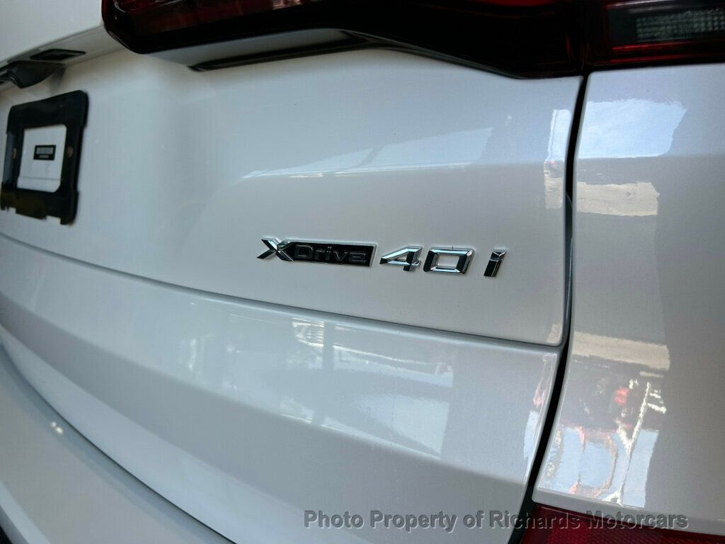 2021 BMW X5 xDrive40i Sports Activity Vehicle - Mineral White Metallic exterior view 8