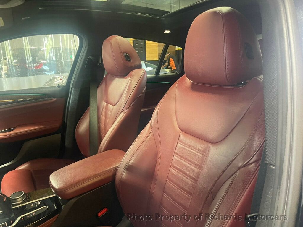 2020 BMW X4 xDrive30i Sports Activity - Black Sapphire Metallic exterior view 10